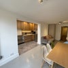 Photo 2: Shared Living Area & Kitchen