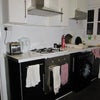Photo 4: Kitchen with washing machine