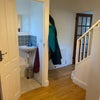 Photo 9: Hall way entance as you come in wirh downstairs toilet