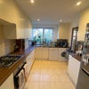 Photo 6: Large bright Kitchen includes pantry & plenty of cupboard space & dish washer  