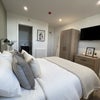 Photo 8: Bedroom 6 w/ Smart TV & Ensuite