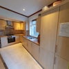 Photo 4: kitchen area in open plan living