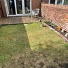 Photo 4: Private garden with decked seating area and grassy area perfect for growing plants