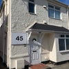 Photo 8: House frontage 