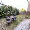 Photo 7: Lovely garden with garden furniture, grass, and privacy