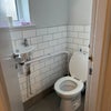 Photo 8: Second toilet with modern white tiling