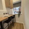Photo 7: COMMUNAL KITCHEN