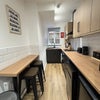 Photo 8: COMMUNAL KITCHEN