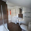 Photo 5: Bathroom with bath and shower