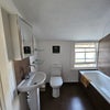 Photo 4: Bathroom with bath and shower