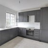 Photo 6: Now includes washing machine, kettle, microwave, table and chairs