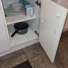 Photo 6: Separate smaller cupboard for plates & pots
