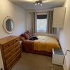 Photo 4: Bedroom with chest of drawers, book shelf, and built in large wardobe and cupboard not shown