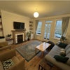 Photo 2: Shared Living Space 