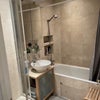 Photo 5: Shared bathroom with bathtub and shower