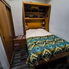 Photo 1: 1.5-size comfortable bed with nightstand and built-in closet.