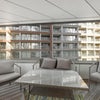 Photo 4: Balcony that opens into the greens on one side