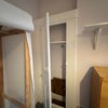 Photo 3: Built in storage cupboard 