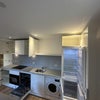 Photo 6: In built washer dryer & microwave oven; fridge & fridger; dishwasher 