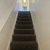 Photo 5: Stairs up to the flat