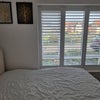 Photo 3: Bedroom with shutter windows