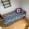 Photo 2: Second part of the spare room with single bed 