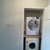 Photo 9: Washer Dryer in hall