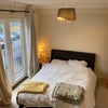 Photo 2: 1F ensuite with private balcony