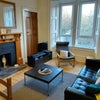 Photo 4: Living room-smart tv, leather sofa and chair