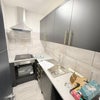 Photo 2: SHARED KITCHEN