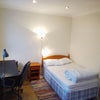 Photo 1: Now available: bed end of very large double room.
