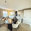 Photo 1: Homely and inviting ipen plan kitchen/living area (Apartment 5)