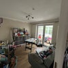 Photo 8: Potential sitting room with access to con and garden. 