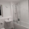 Photo 8: Upstairs toilet and bath
