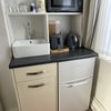 Photo 3: Kitchenette with sink and fridge freezer, microwave and kettle.