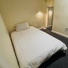 Photo 2: Double bed provided, suitable for single occupancy.