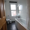Photo 4: first floor bathroom with double shower over bath