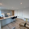 Photo 6: Shared living room.