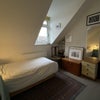 Photo 1: The room that's to rent. It faces away from the street so is very quiet. Plenty of storage alongside