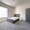 Photo 5: Room 2 - 1st Floor (extra storage space through the door) 