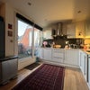 Photo 7: Bifold doors open to our balcony