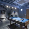 Photo 6: Games room with pool table – perfect for relaxing and socialising with friends.