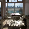 Photo 8: view through dining space to W facing balcony