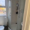 Photo 4: Upstairs bathroom/shower