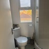 Photo 5: Upstairs bathroom/shower