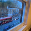Photo 6: Looking out at the street from the room