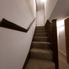 Photo 6: Stairs to upper floor