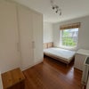 Photo 1: King-sized bed, fitted wardrobes with lots of storage, and a desk can fit in front of the radiator