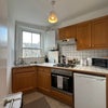 Photo 4: Kitchen with fridge, oven, microwave, toaster and kettle