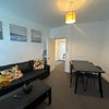 Photo 5: Living Room with couch and dining table